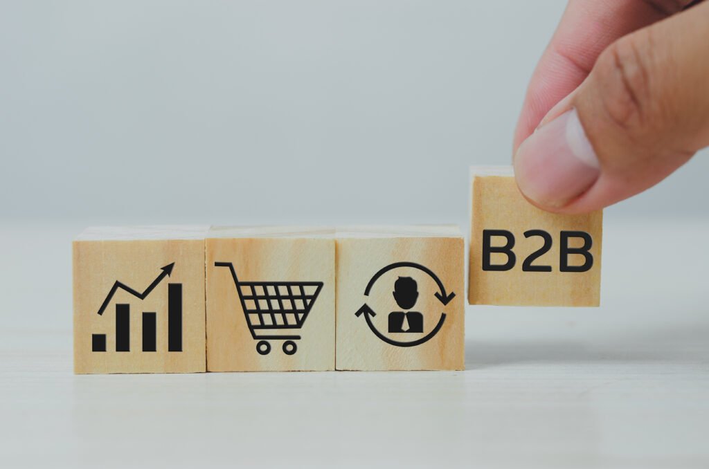 hand put wooden cubes with b2b business business table copy spacebusiness concepts